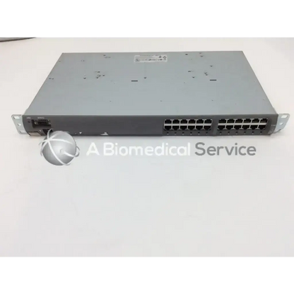 Gray metal PowerDsine 6512 PoE 12-port ethernet midspan switch with multiple ports and rack-mount brackets