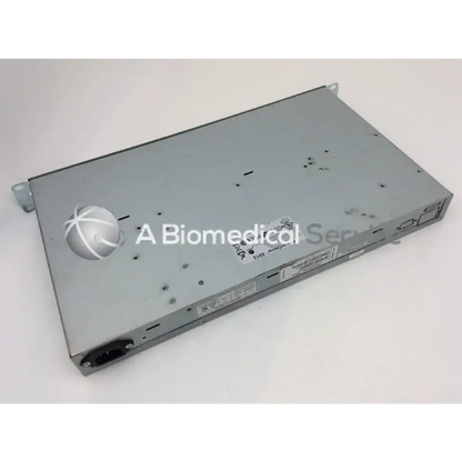 Silver metallic PowerDsine 6512 PD-6512G/AC/M poe 12-port ethernet midspan switch with circular logo on top left