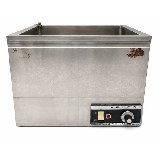 Silver stainless steel laboratory water bath with black control panel by thelco model 83