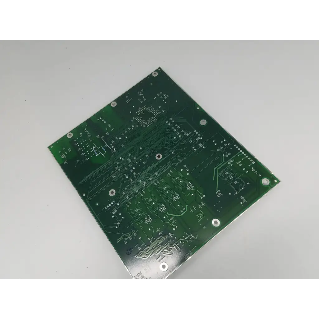 Green rectangular processor control pcb rev h bbca1-11 with silver solder pads and intricate copper traces