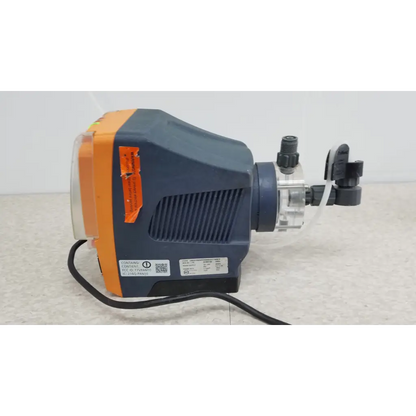 Blue and orange ProMinent Gamma X GMXA 1009 diaphragm metering pump with black fittings and transparent tubing assembly