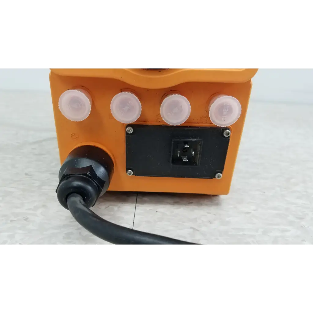 Orange plastic ProMinent Gamma X GMXA 1009 diaphragm metering pump with four white caps and black electrical plug