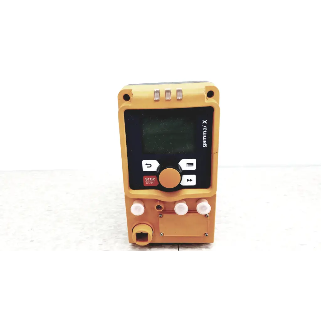 Yellow gamma x handheld industrial control device with black screen white buttons and orange dial for diaphragm metering pump