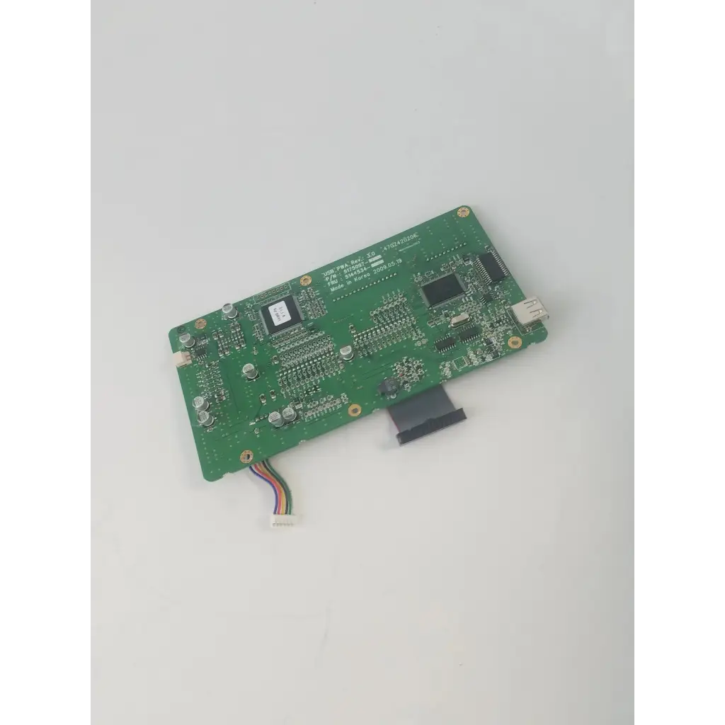 Green printed circuit board usb control board with electronic components and multi-colored ribbon cable for usb control