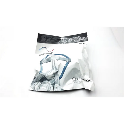 Quattro air full face mask small in white and black packaging with transparent plastic and blue accents face mask small