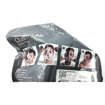 Black plastic packaging showing the back of a quattro air full face mask small with instructional diagrams and product details