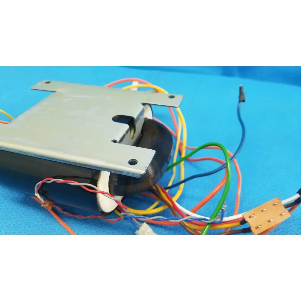Metallic gray rectangular core power transformer with black cylindrical core and colored wires for retinal camera use