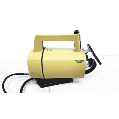 Yellow raychem ir-850 industrial infrared heat shrink heater with black handle and base in raychem ir-550 heat shrink station