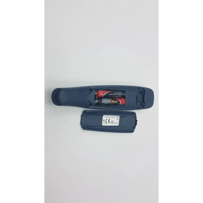 Back side of dark blue plastic readingpen advanced edition remote control with duracell procell batteries and regulatory labels