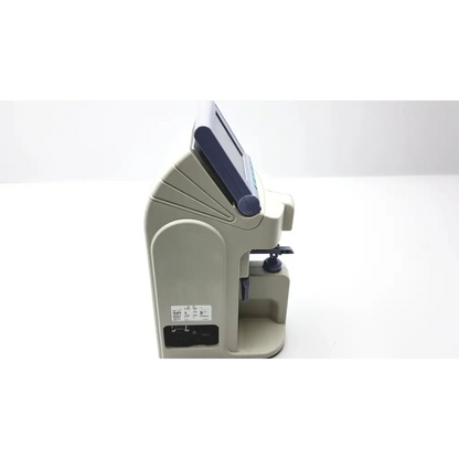 Beige plastic reichert al500 auto lensometer with dark blue digital display and black control buttons for lens measurement