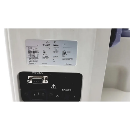 White plastic industrial welder with black control panel and silver label showing specs on reichert al500 auto lensometer