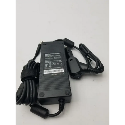 Black plastic resmed 90w dc adapter r370-7231 with coiled cables and car charger attachment for portable use