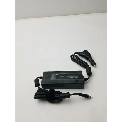 Black plastic resmed 90w dc adapter r370-7231 with car adapter and coiled power cord for laptop charging