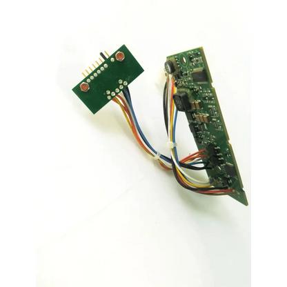 Green main board bbcb3-8b 1084030 by respironics inc with colored wires connected to a smaller green connector plate