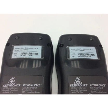 Two black respironics alice 5 headbox devices model 1099901 with serial numbers in respironics sleep diagnostic equipment guide