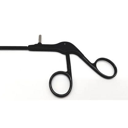 Black richard wolf 8383.12 laparoscopic insulated punch with sleek ergonomic design and metallic tip