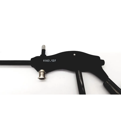 Black plastic-handled richard wolf endoscopic double action short cup tool with metallic threaded ends and serial number 8383.127