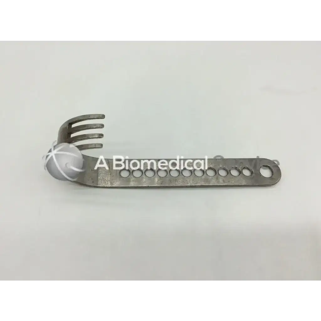 Silver metallic nephew deep blades surgical retractor with curved handle and circular holes 63.5 mm 11-1654