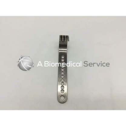 Silver metallic nephew deep blades surgical instrument with circular holes and forked end for self-retaining retractor