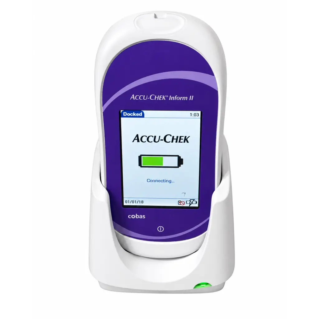 White and purple roche cobas accu-chek inform ii glucose meter with digital battery display docked in charging base