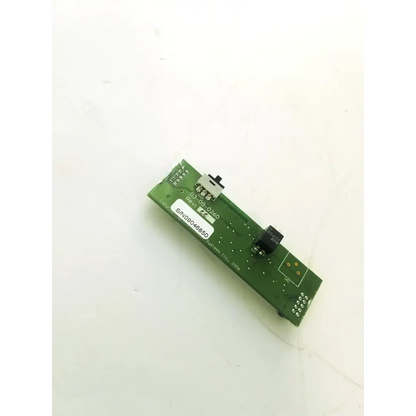 Green rectangular circuit board bbcb3-10a with black electronic components and white label rtf 03-09-0260 rev 00