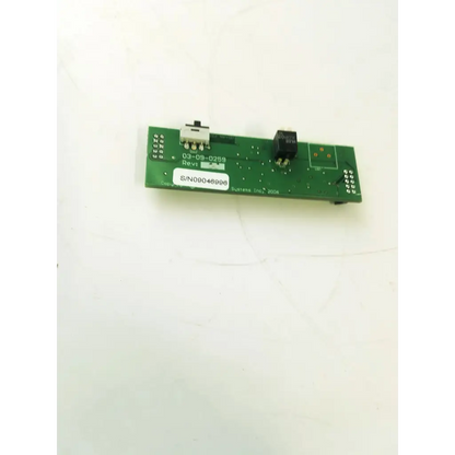 Green rectangular circuit board bbcb3-10a with black components and white label s n09046908 for board bbcb3-10a 22523sm