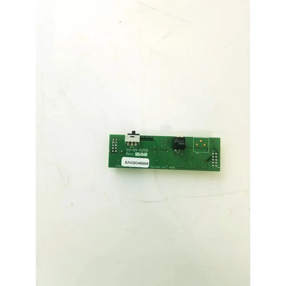 Green rectangular circuit board bbcb3-10a with black electronic components and white label s n09046898 for board 22523sm