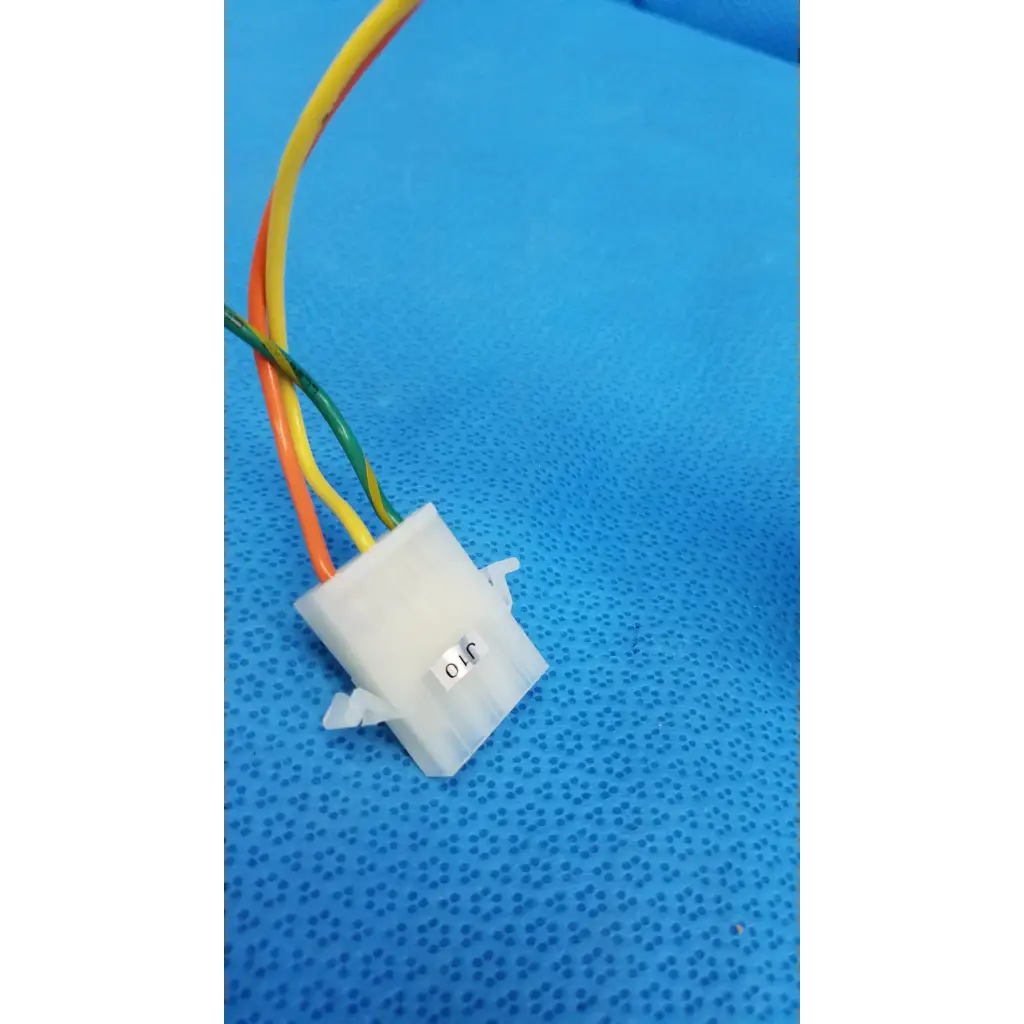 White plastic connector with orange yellow and green wires for rubycon photo capacitor 330v 1800uf in retinal camera trc-nw6s