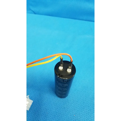 Black cylindrical rubycon photo capacitor 330v 1800uf with terminals and orange-yellow wires for trc-nw6s retinal camera