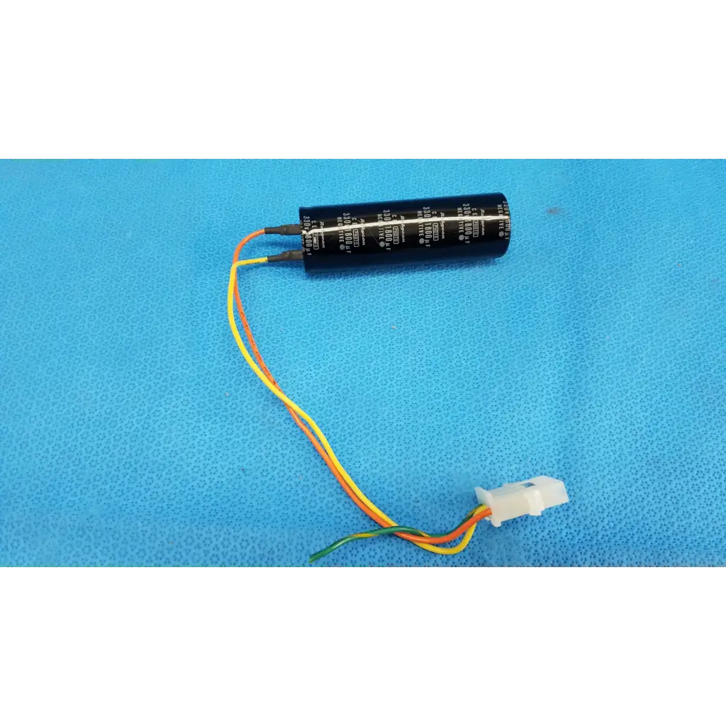 Black Rubycon photo capacitor with yellow and orange wires and white connector for Topcon TRC-NW6S retinal camera