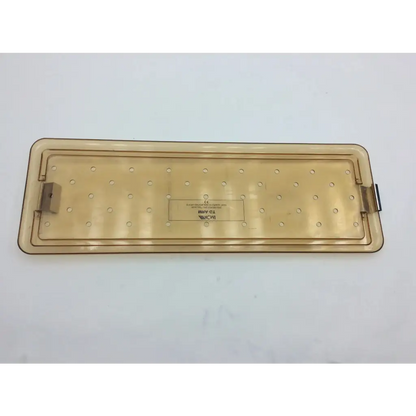 Translucent amber plastic lid with circular holes and metal latches for acmi mra-gt telescope model s6984