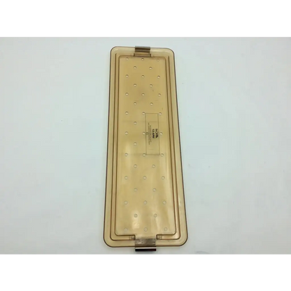 Transparent amber plastic lid with grid indentations and metallic hinges for acmi mra-gt telescope model s6984