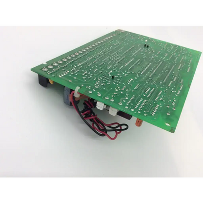 Green rectangular printed circuit board with silver soldered components and red black wires saf162e f146 fa162c pcb board