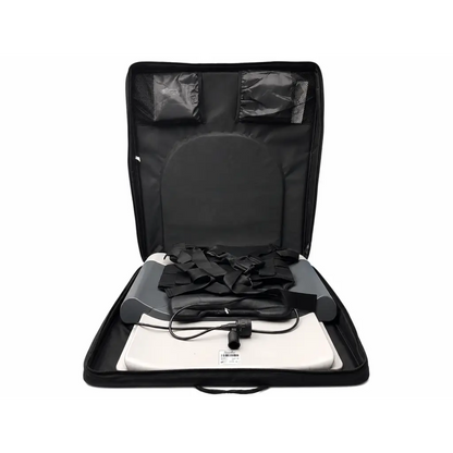 Black carrying case with white and gray inflatable lumbar traction device and power cord for at-home use by Saunders