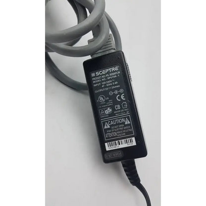 Black rectangular sceptre spu15a-1 switching power supply with gray coiled cable for desktop power supply use