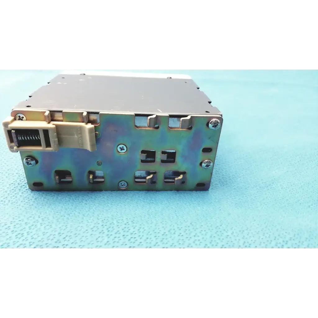 Metallic schneider electric abl7 rp1205 switch mode din rail power supply with beige connector and visible screws backside