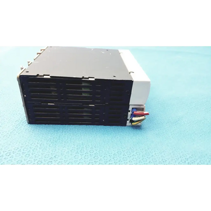 Black and white schneider electric abl7 rp1205 switch mode power supply with colored wires for industrial use