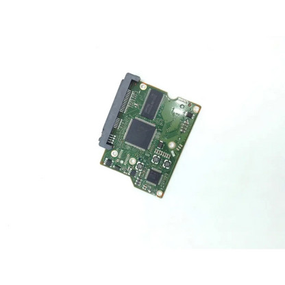 Green circuit board with black integrated circuits and gray connector on seagate st3500418as hard drive pcb for responsible electronics recycling