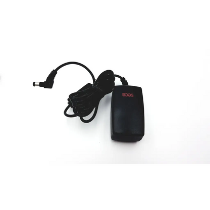 Seca medical power supply 400-0000-009 black plastic adapter with coiled cable and red sees branding for medical power use