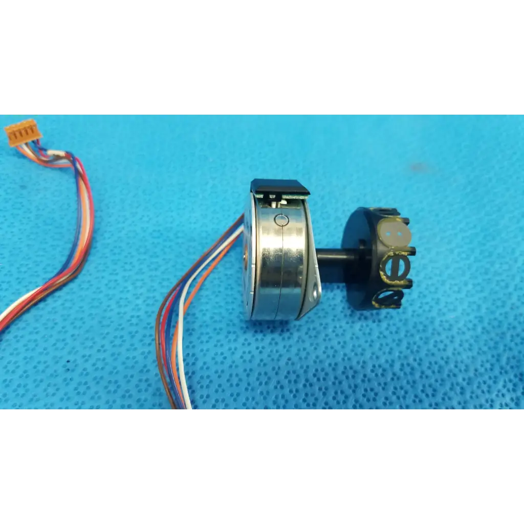 Silver metallic stepper motor with black housing and multi-colored wiring for seiko epson internal shutter assembly