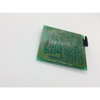 Green rectangular seiko 3b66264492 sii board with intricate silver traces and black connector on one corner