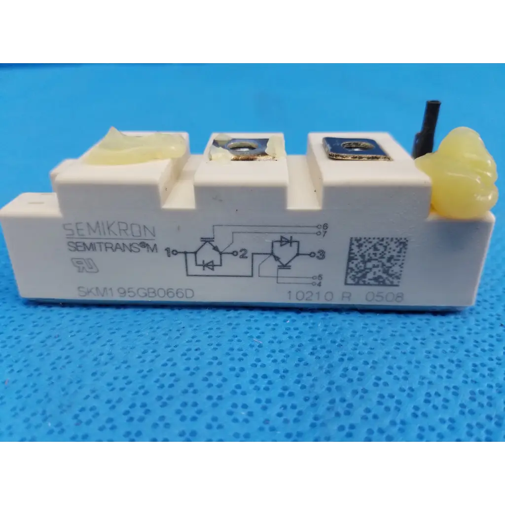 White semikron skm195gb066d igbt power module with yellow insulating caps and black terminal pin for high power use