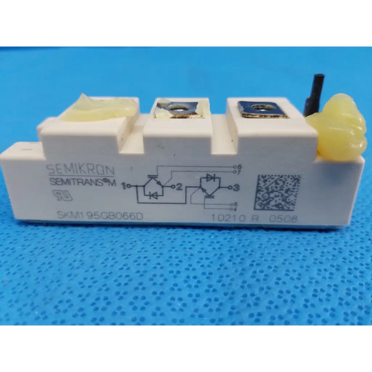 White semikron skm195gb066d igbt power module with yellow insulating caps and black terminal pin for high power use