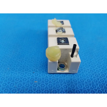 Semikron skm195gb066d white ceramic igbt power module with black terminal connectors and yellowish plastic components