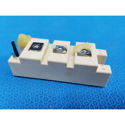 Semikron SKM195GB066D white ceramic igbt power module with three metallic terminal screws and black insulated wire