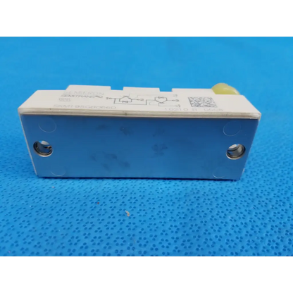 Blue and white semikron skm195gb066d semitrans m igbt power module with yellow plastic component on top