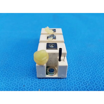 White ceramic Semikron SKM195GB066D igbt power module with black terminal caps and metallic screw terminals