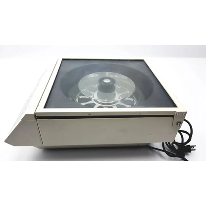 Silver metallic shandon life sciences cytospin 3 centrifuge with clear glass lid and rotating platform for laboratory use
