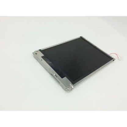 Silver-framed sharp lcd lq084v1dg21 display panel with black screen and visible wiring on the back side
