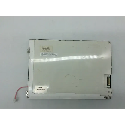 Sharp lcd lq084v1dg21 display panel lq084y5d23 with white plastic casing and visible connection ports back side view